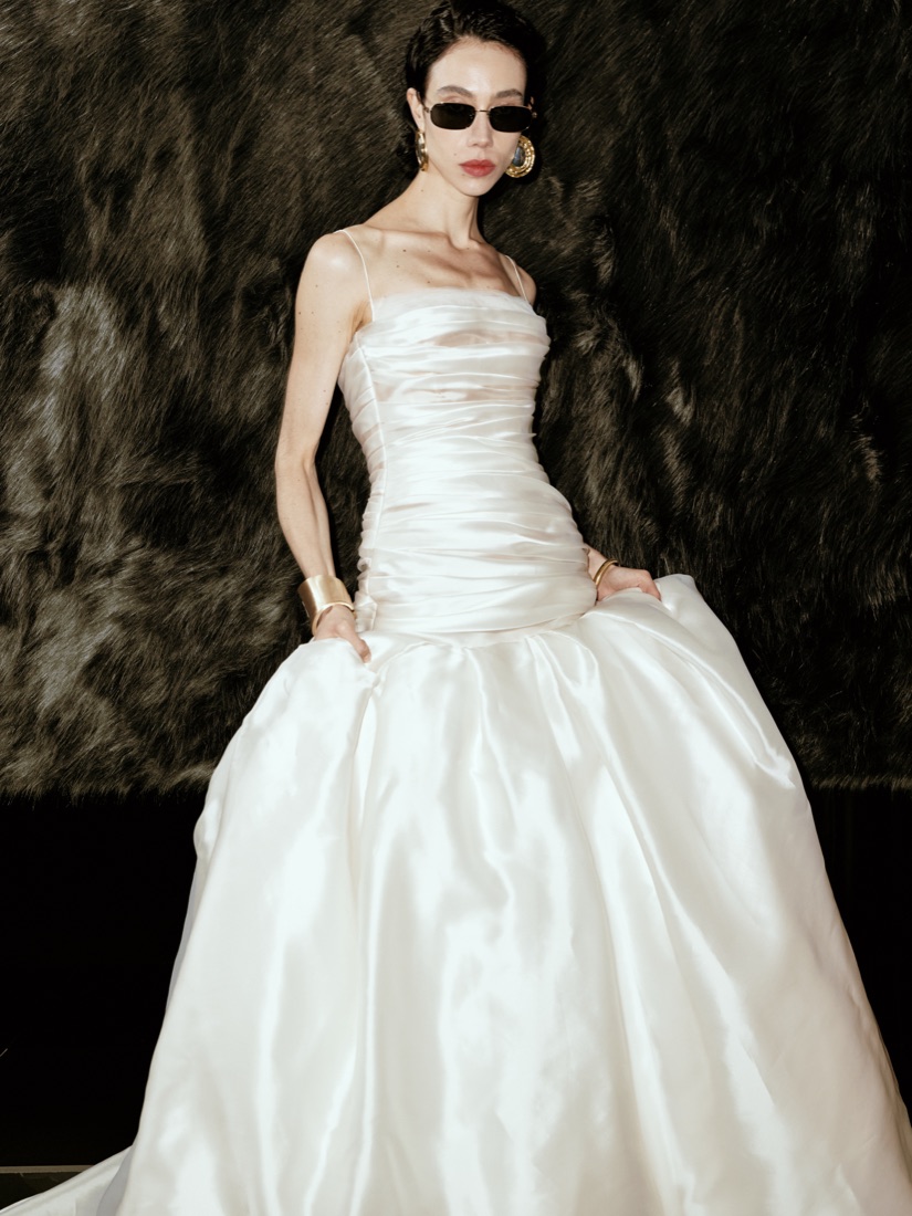 A ruched satin gown at Lichée Bridal, Bay Area