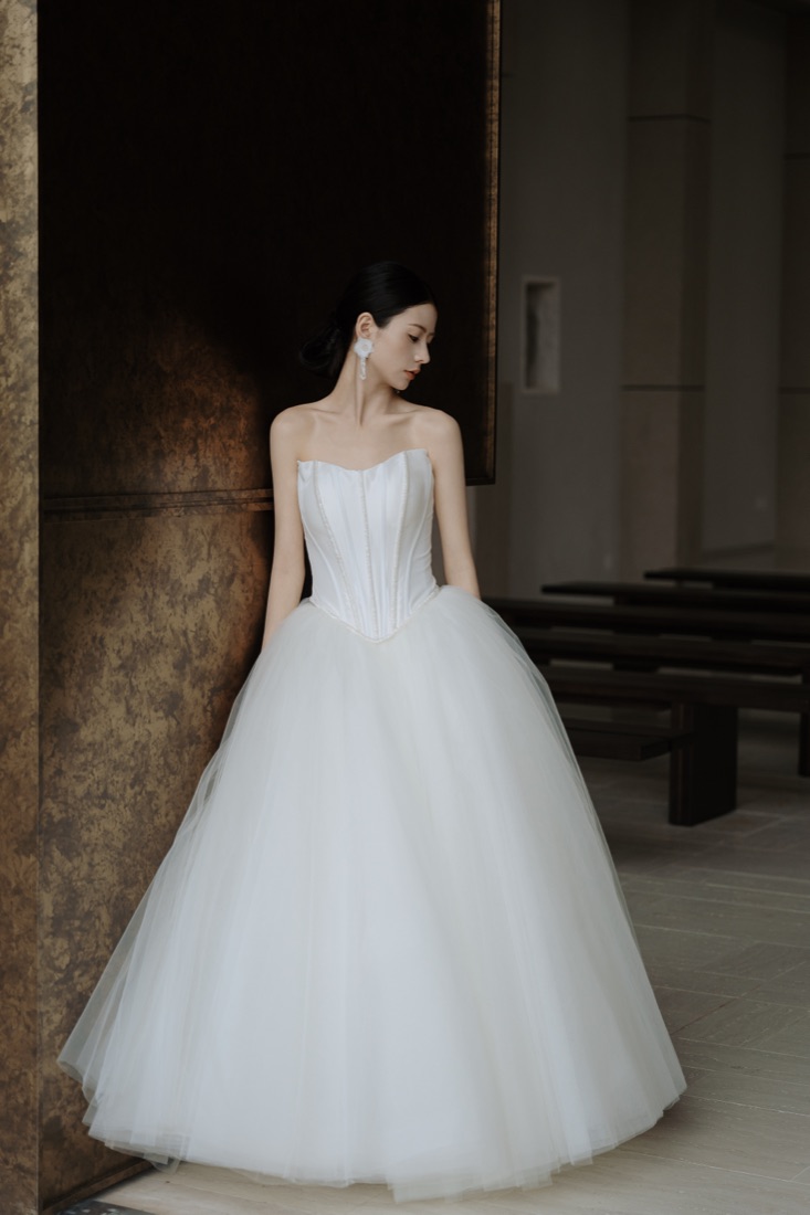 A corseted gown at Lichée Bridal, Bay Area — detail 2 of 6